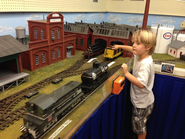 Lucas playing with trains