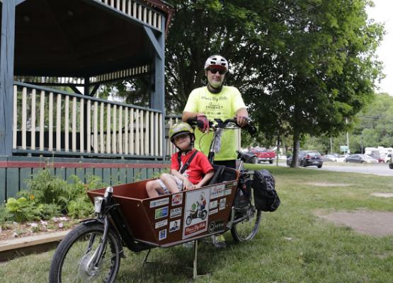 A dad pedals his son 600 km in search of a cure