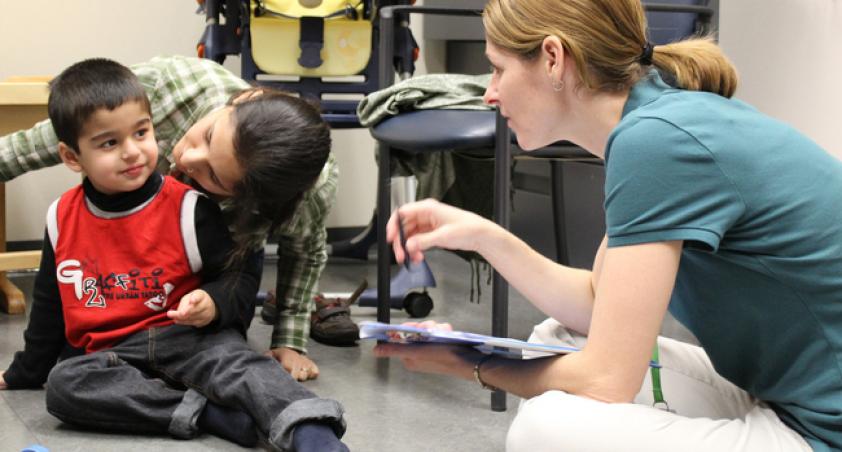 Child being assessed by clinician