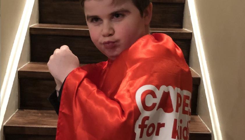 Emery strikes a pose in his Capes for Kids cape