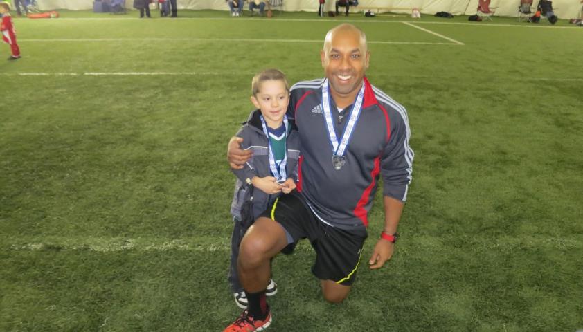 Carter with his coach. 