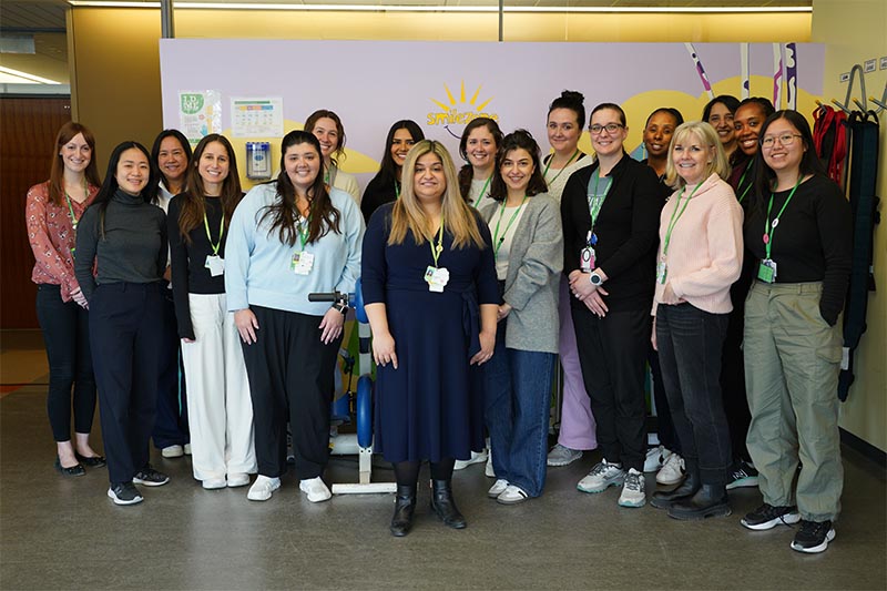 Dr. Ladha (centre) with a Holland Bloorview multidisciplinary team