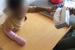 Pull out ribbons, scarves, small toys hidden inside a tissue box (tissue box can be taped to wall).