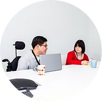 2 people in a meeting