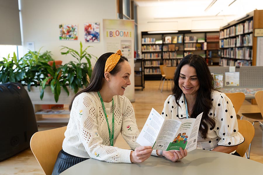 Two people in a library