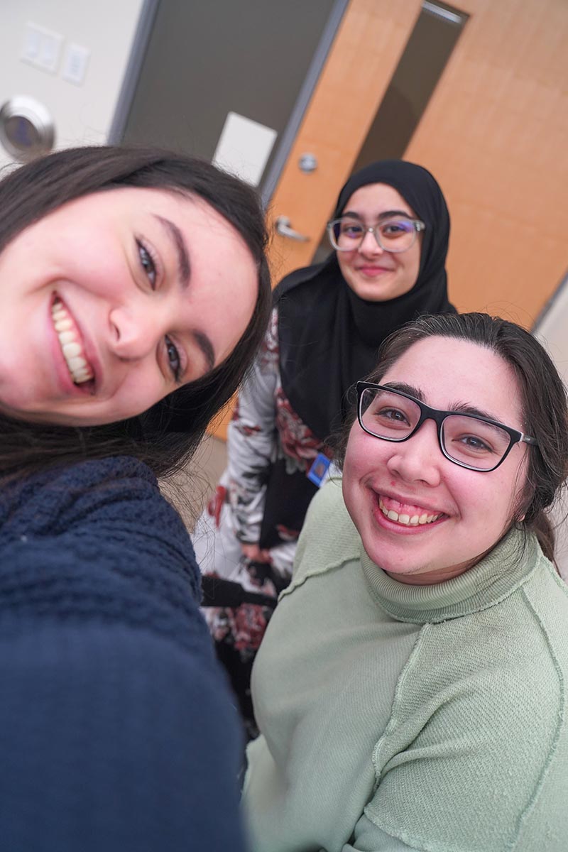Three teens are showing smile on their face
