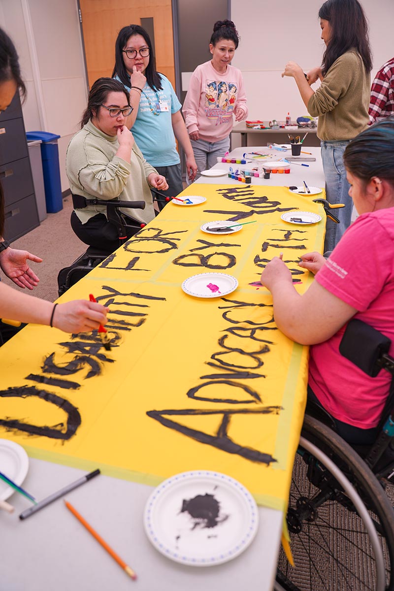 Some youths are making a big banner