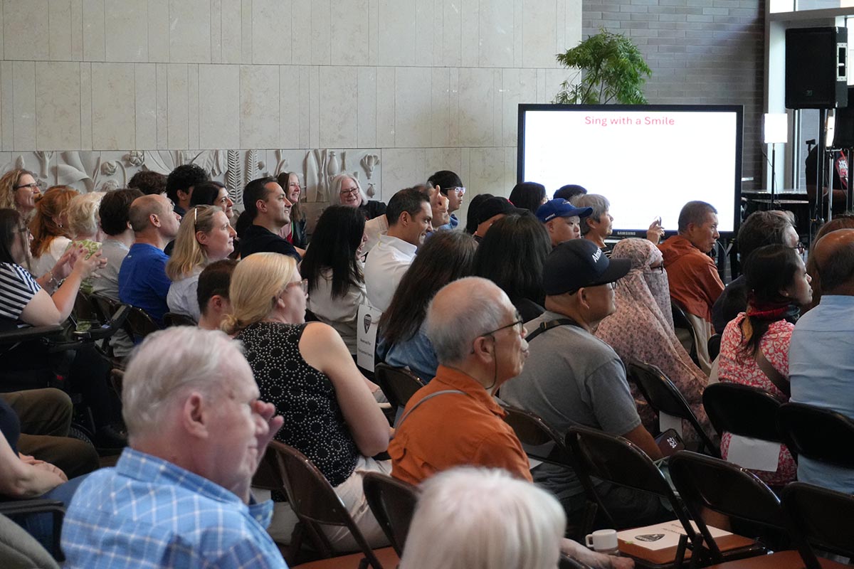 The crowd gathers in Holland Bloorview’s atrium to watch the concert.