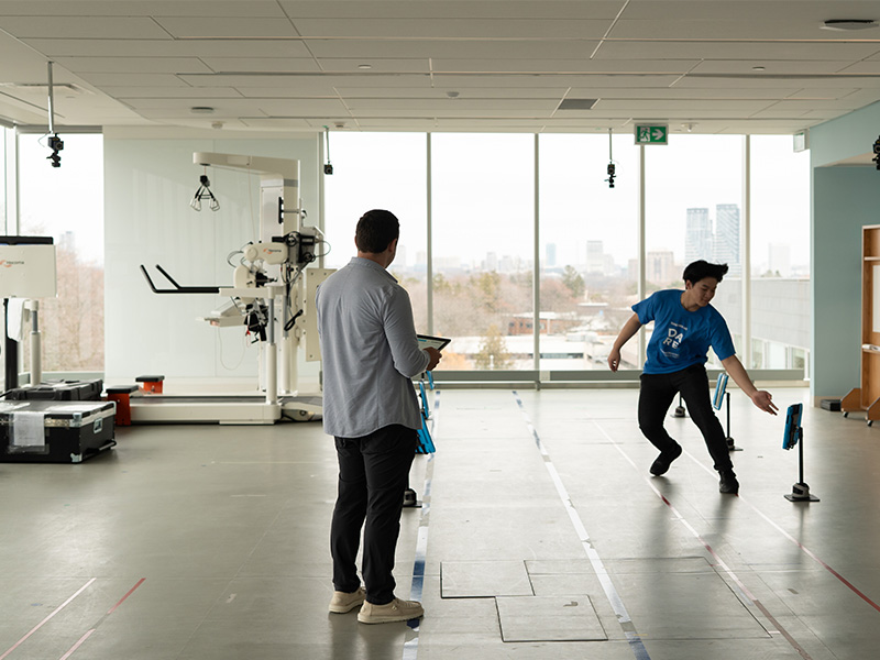 A young person plays a simulated sports activity in therapy