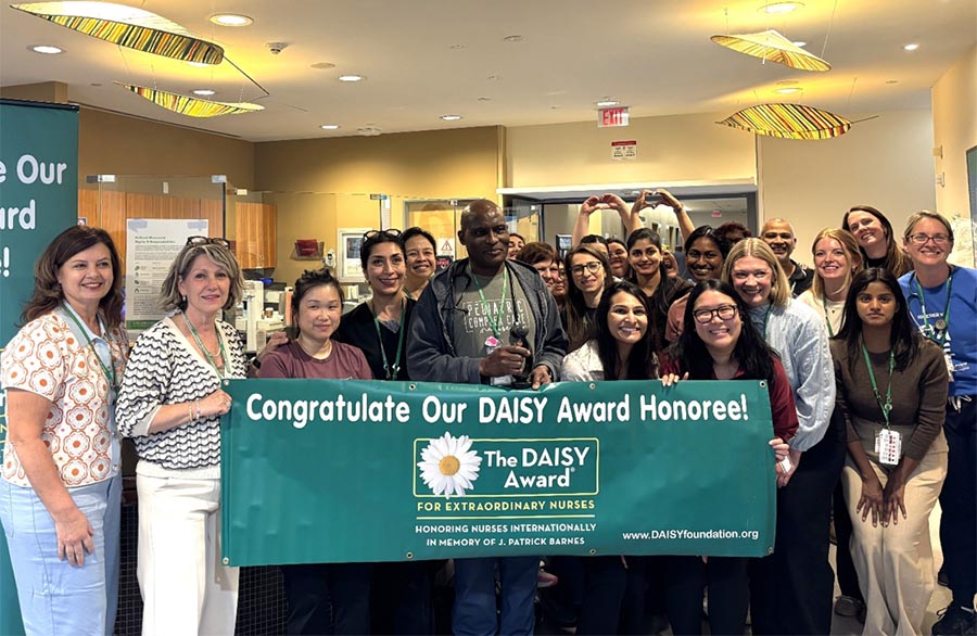 Sid Ramakie, Registered Nurse, receives a DAISY Award alongside colleagues at Holland Bloorview Kids Rehabilitation Hospital. The recognition celebrates excellence in nursing care during Nursing Week.