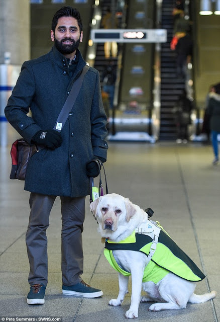 Photo of Amit Patel and his service dog