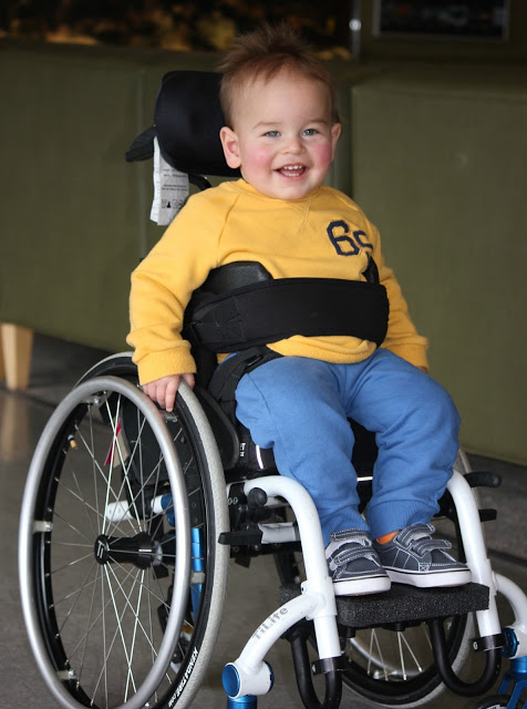 Noah in his wheelchair