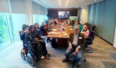 Group of people having a meeting in a room
