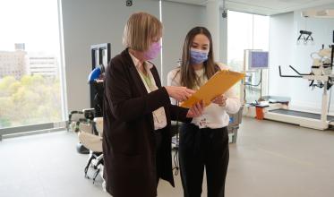 Staff looking over data