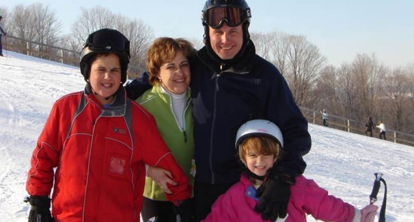 Mitchell with his family skiiing