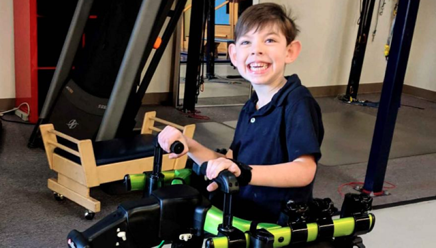 boy using a mobility device