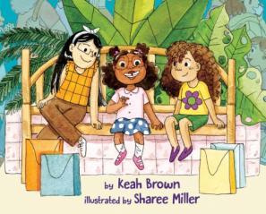 Three young girls with big smiles sit on a bench with their shopping bags in front of them