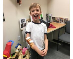 Nolen wearing his prosthetic for the first time. 