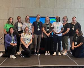 Group photo of some people standing on a stage