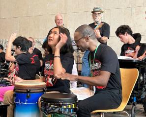 group of HB Rocks participants playing in concert