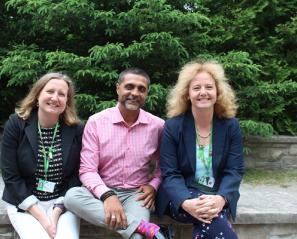 Jean Hammond (left) family and centred care specialist, sits with Amir Karmali (middle) and Kathryn Parker (right). This core team was integral to the development and delivery of the PFCC training program.