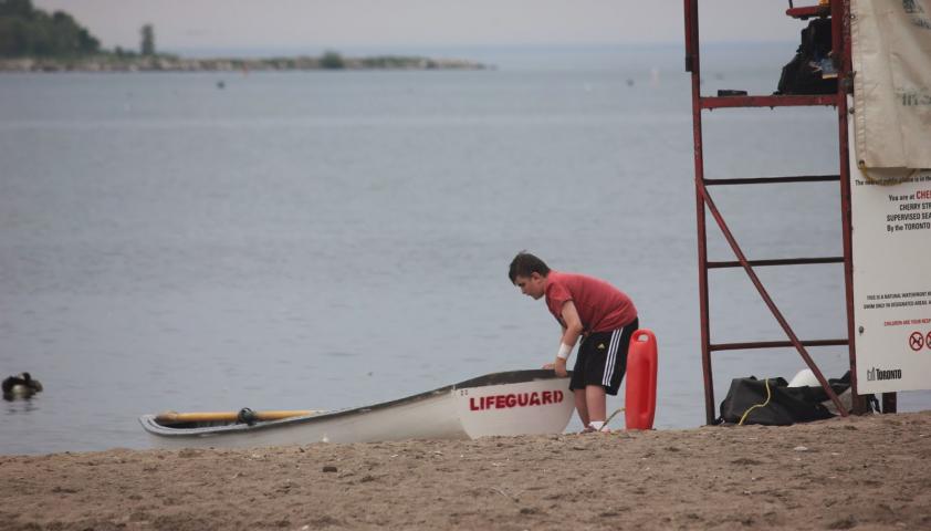 Ben investigating the lifeguard boat