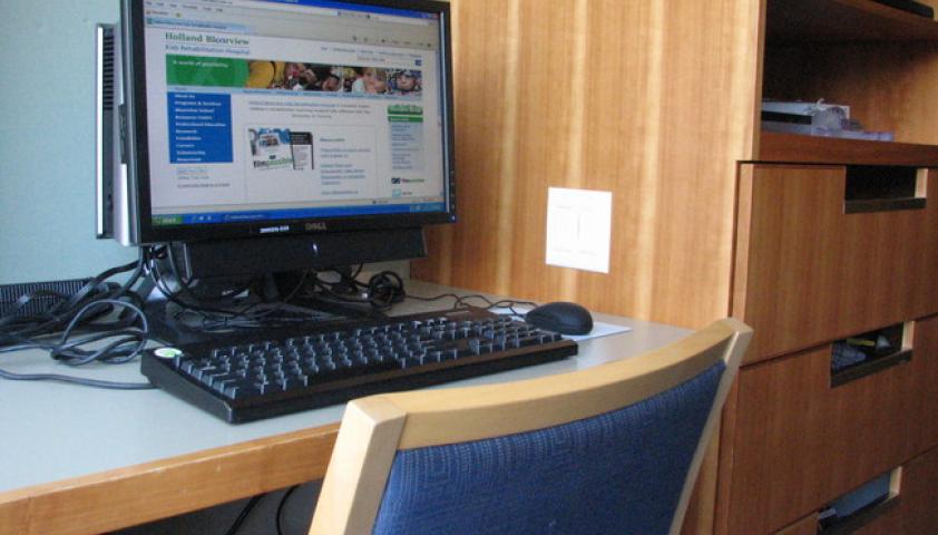 Computers, desks, televisions, and sleeper chairs are available in client rooms