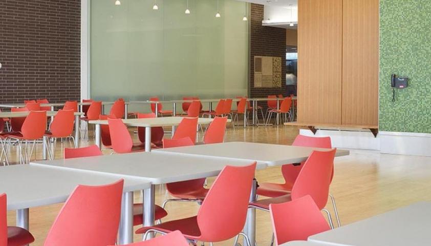 The cafeteria features comfortable seating with lots of natural light