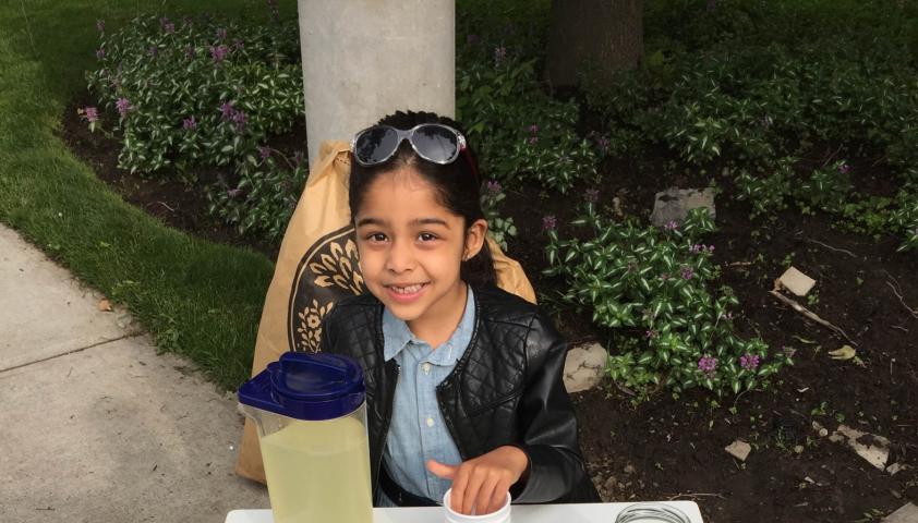 Rhea hosting a lemonade stand