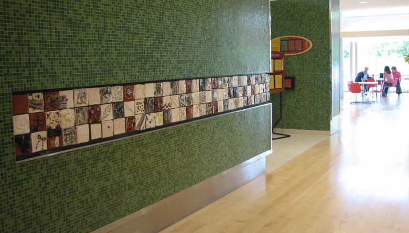 Artistic ceramic tiles are incorporated into the architecture and design of the building
