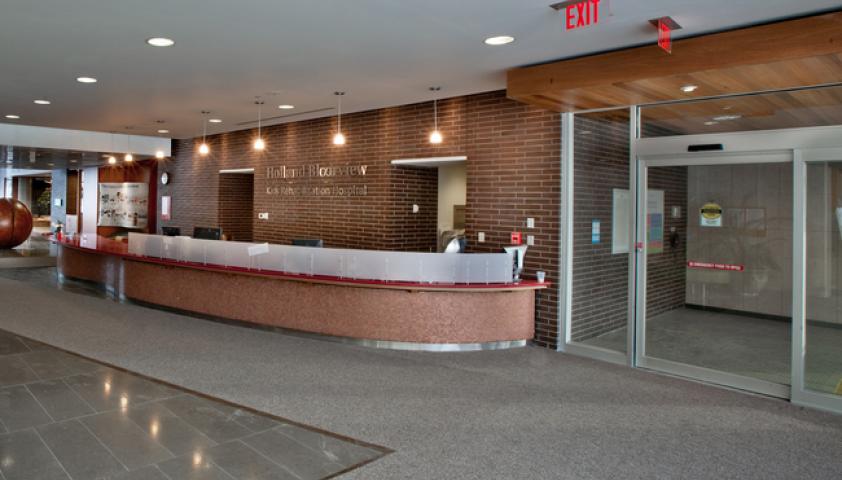 As you enter the hospital through the sliding doors, main reception is to your right