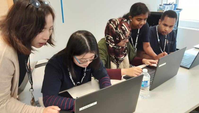Project SEARCH students doing more computer training.