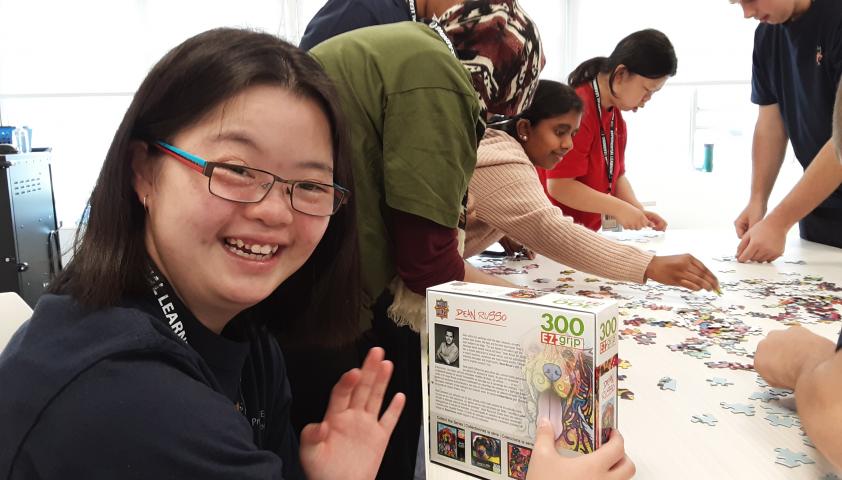 Project SEARCH students doing a puzzle team building activity.