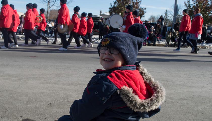 Alex watching a parade