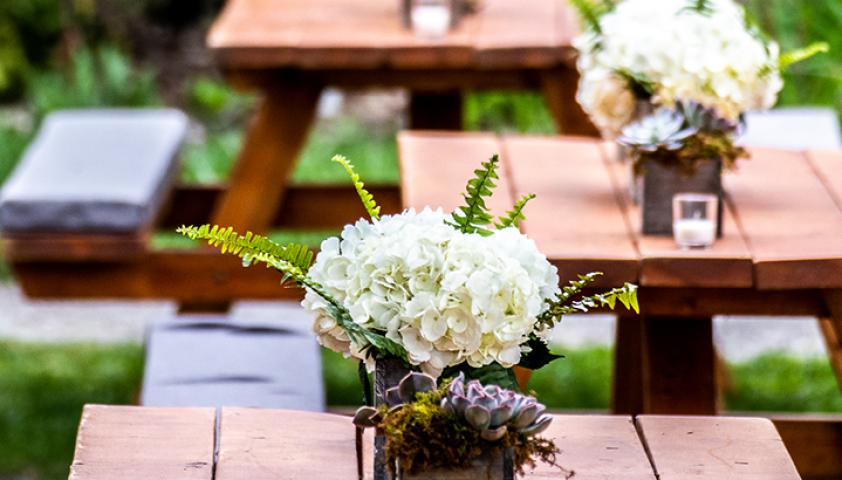 flowers on picnic tables