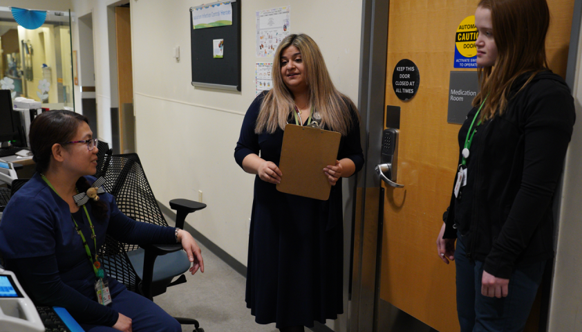 group of adults talking