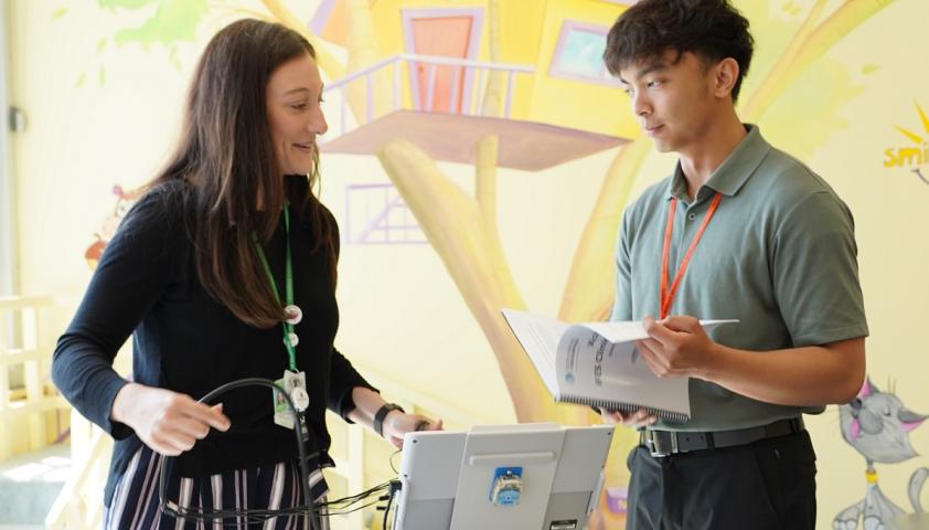 Madison and Gian Carlo reviewing notes