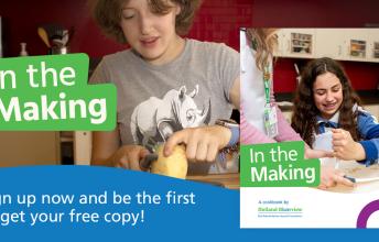 Two young girls cooking in the therapeutic kitchen at Holland Bloorview.
