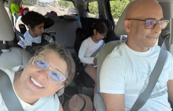 family in car