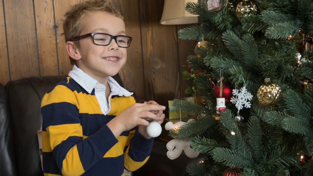 Alex decorating the Christmas tree