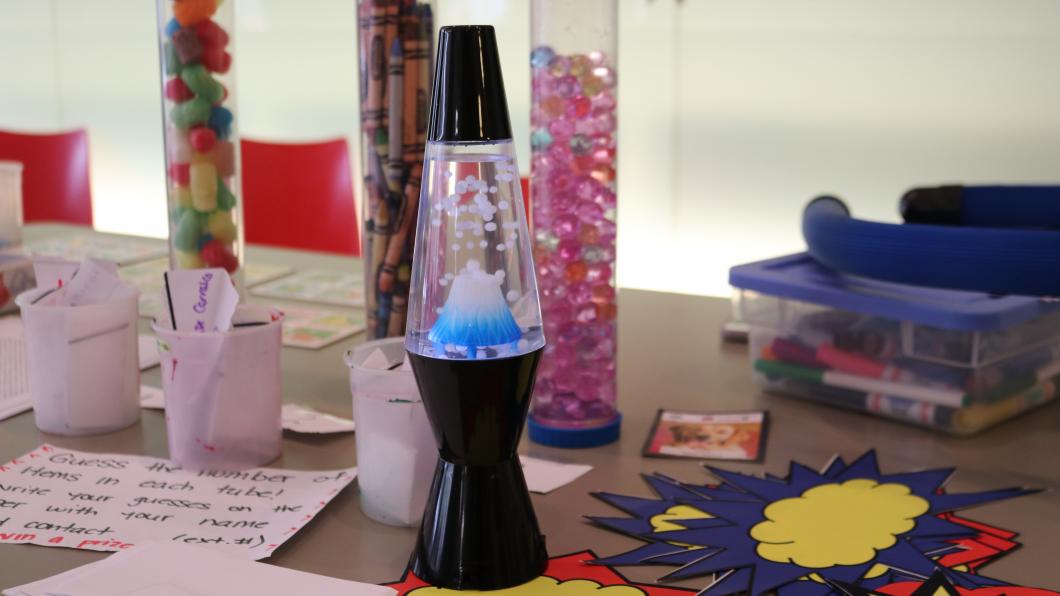 A lava lamp on a table. 
