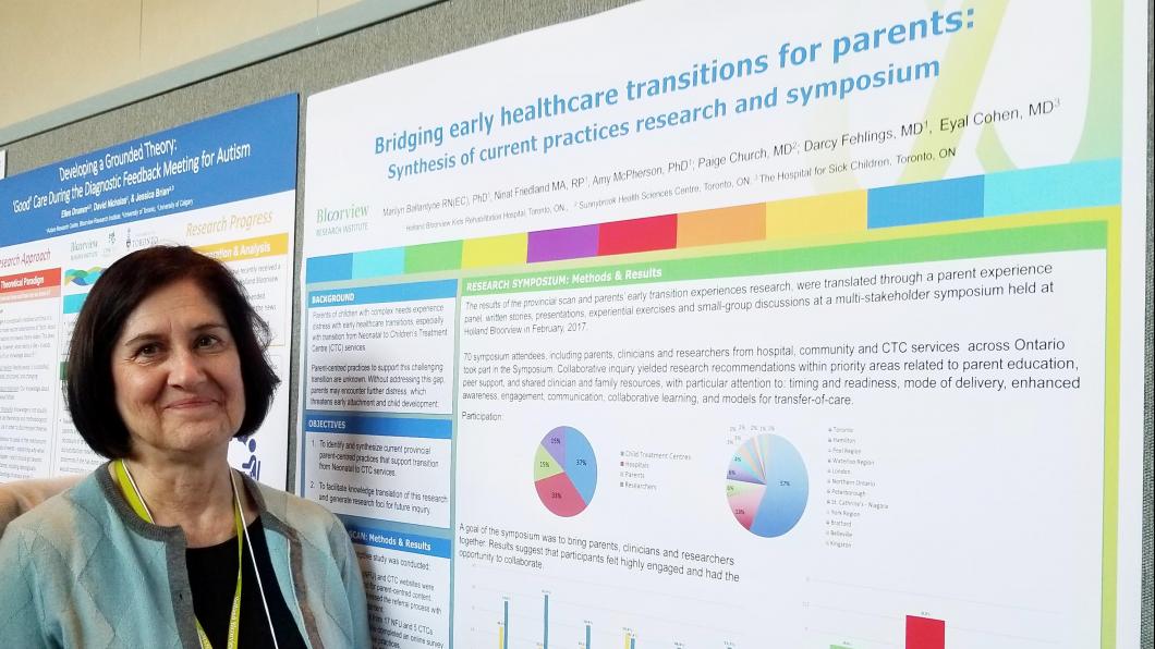 Woman stands in front of research poster