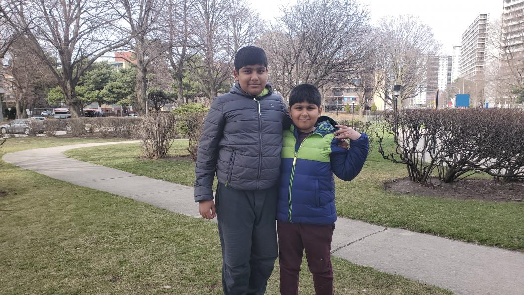 Mahad and Zain outside. 