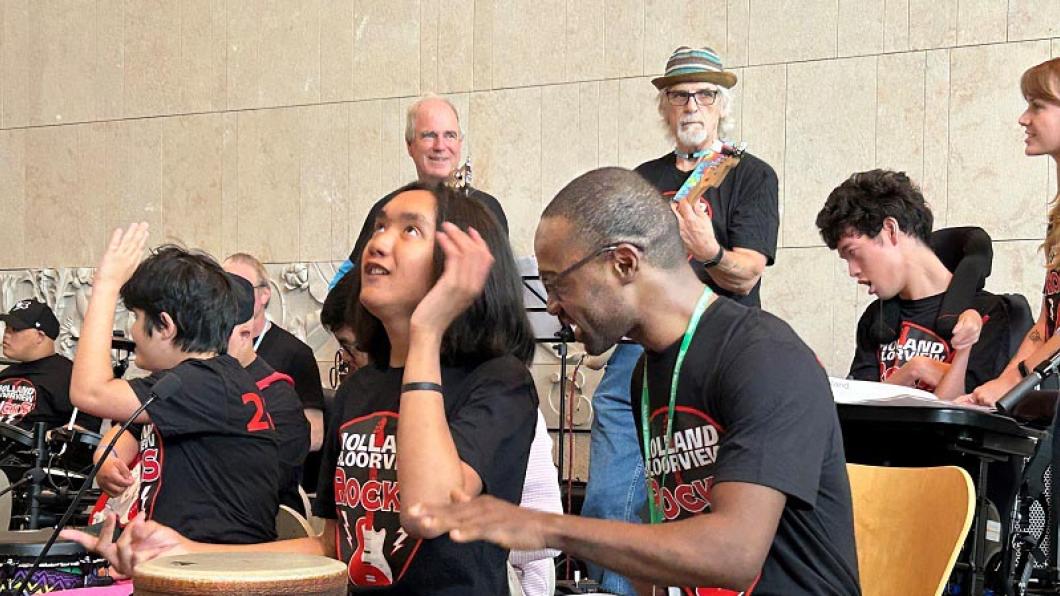 group of HB Rocks participants playing in concert