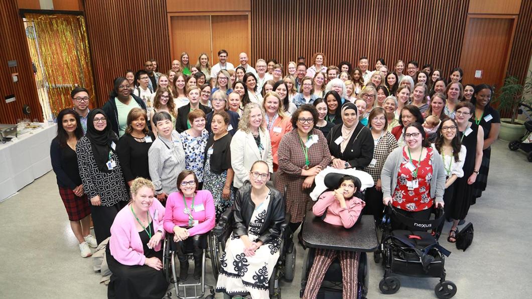 A big group of people in an indoor setting.