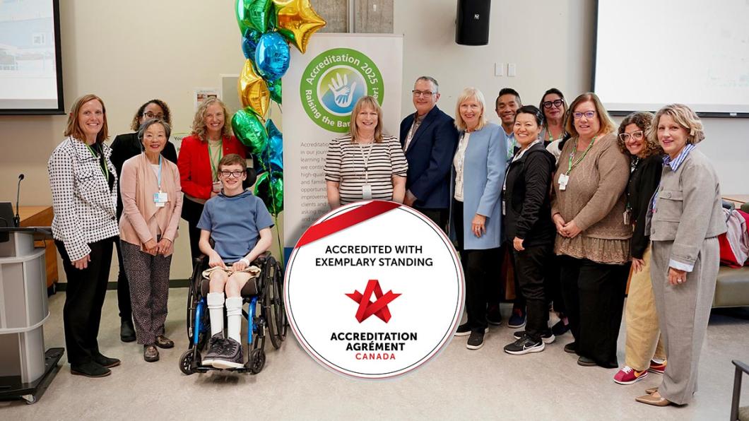 A group of people with the Accreditation Canada badge