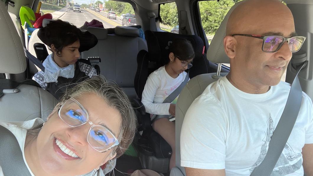 family in car
