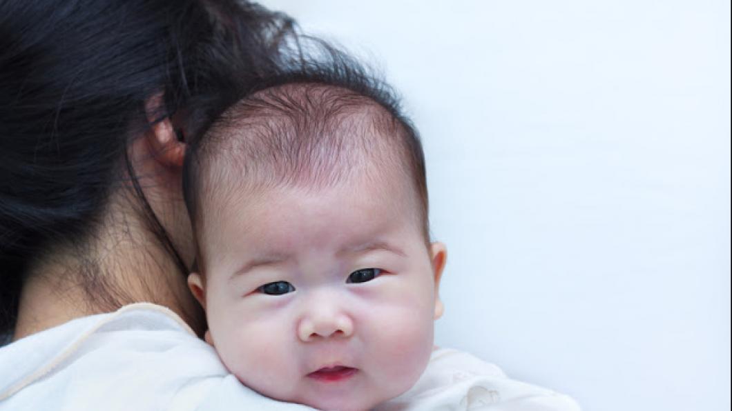 Woman holding a baby