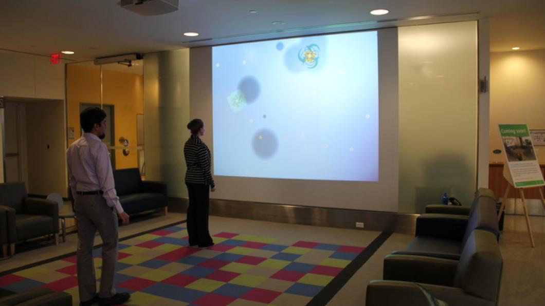 ScreenPlay's pressure-sensitive floor of 100 brightly coloured tiles where kids step or wheel across the tiles to generate, grow and shift colourful images on-screen.
