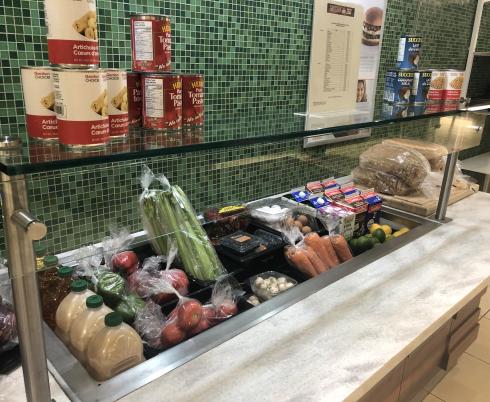 Celery, milk, and eggs are some of the products available at the pop-up grocery store.